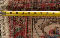 A Tabriz Wool Rug