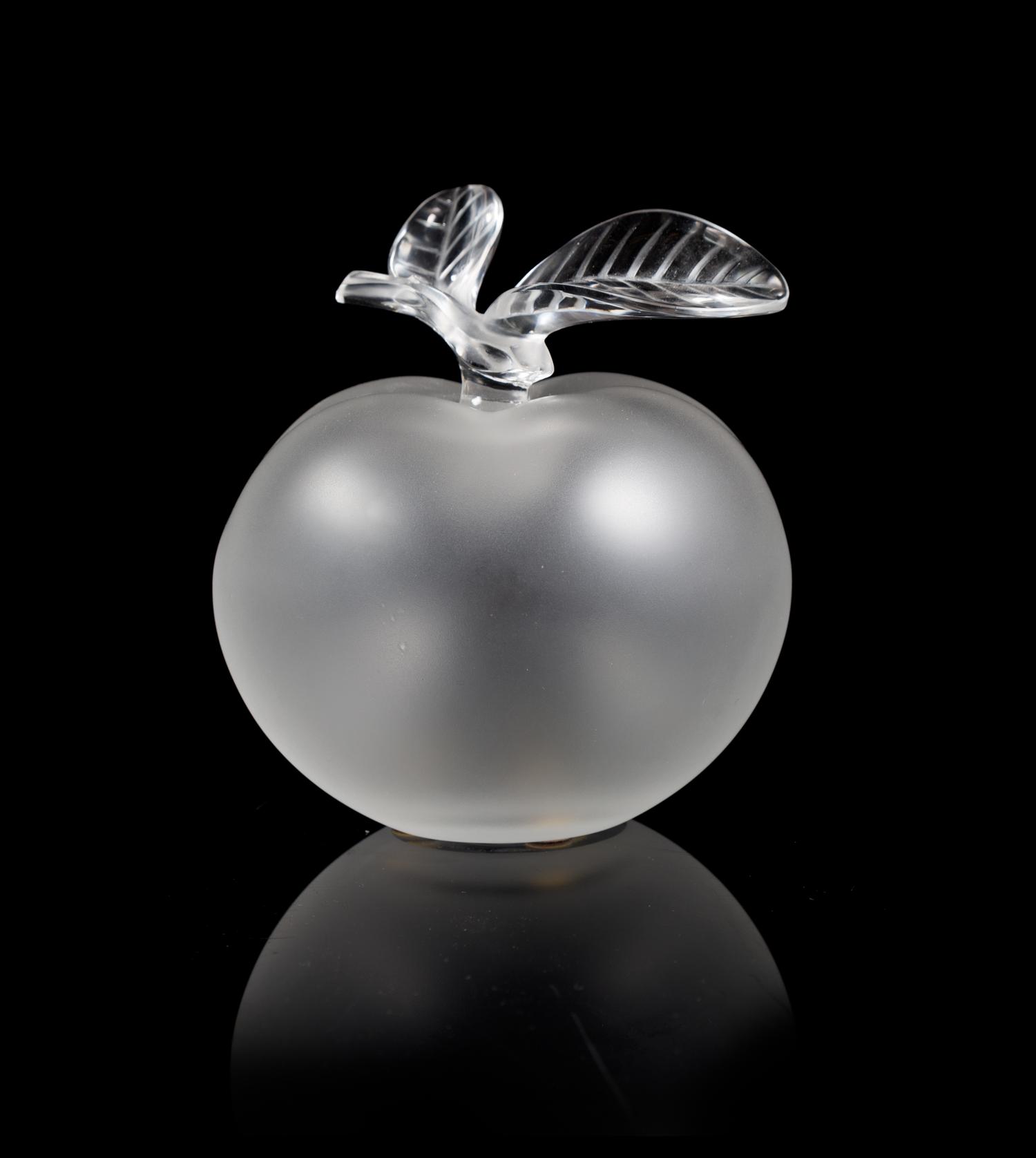 Lalique, a molded and frosted glass Grand Pomme figural perfume bottle, in the form of an apple with leafy stem form stopper