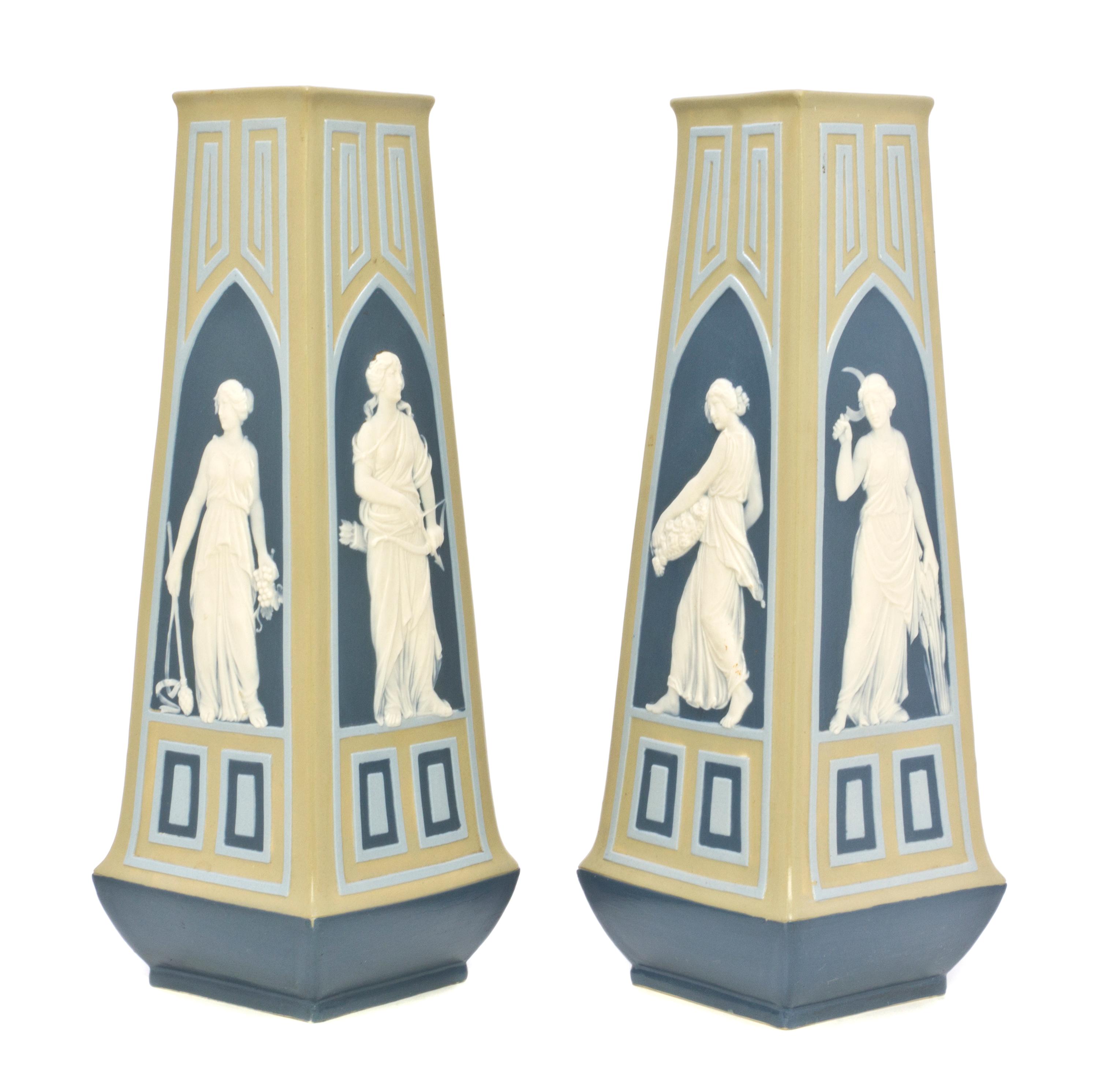 A Pair of Mettlach Ceramic Vases, Height 11 1/2 inches.