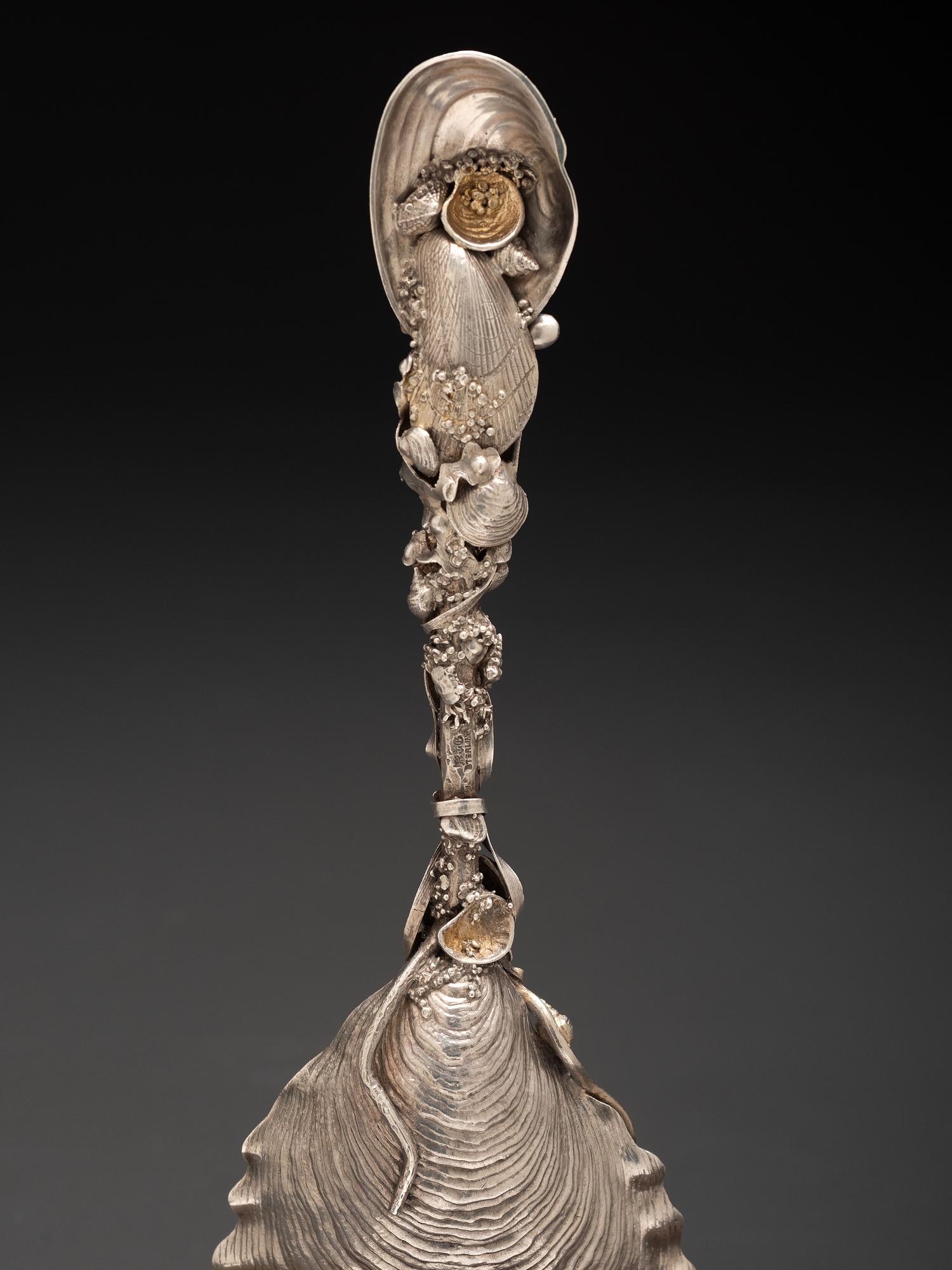 An American Parcel Gilt Silver Serving Spoon