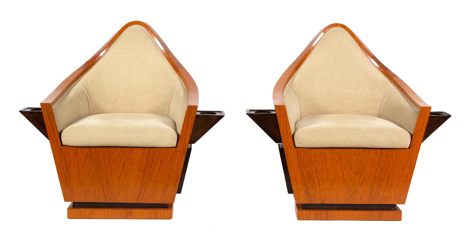 A Pair of Art Deco Birch Veneer Swivel Club Chairs Height 38 x width 40 1/2 inches. — EARLY 20TH CENTURY