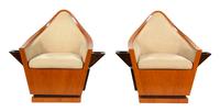 A Pair of Art Deco Birch Veneer Swivel Club Chairs Height 38 x width 40 1/2 inches. — EARLY 20TH CENTURY