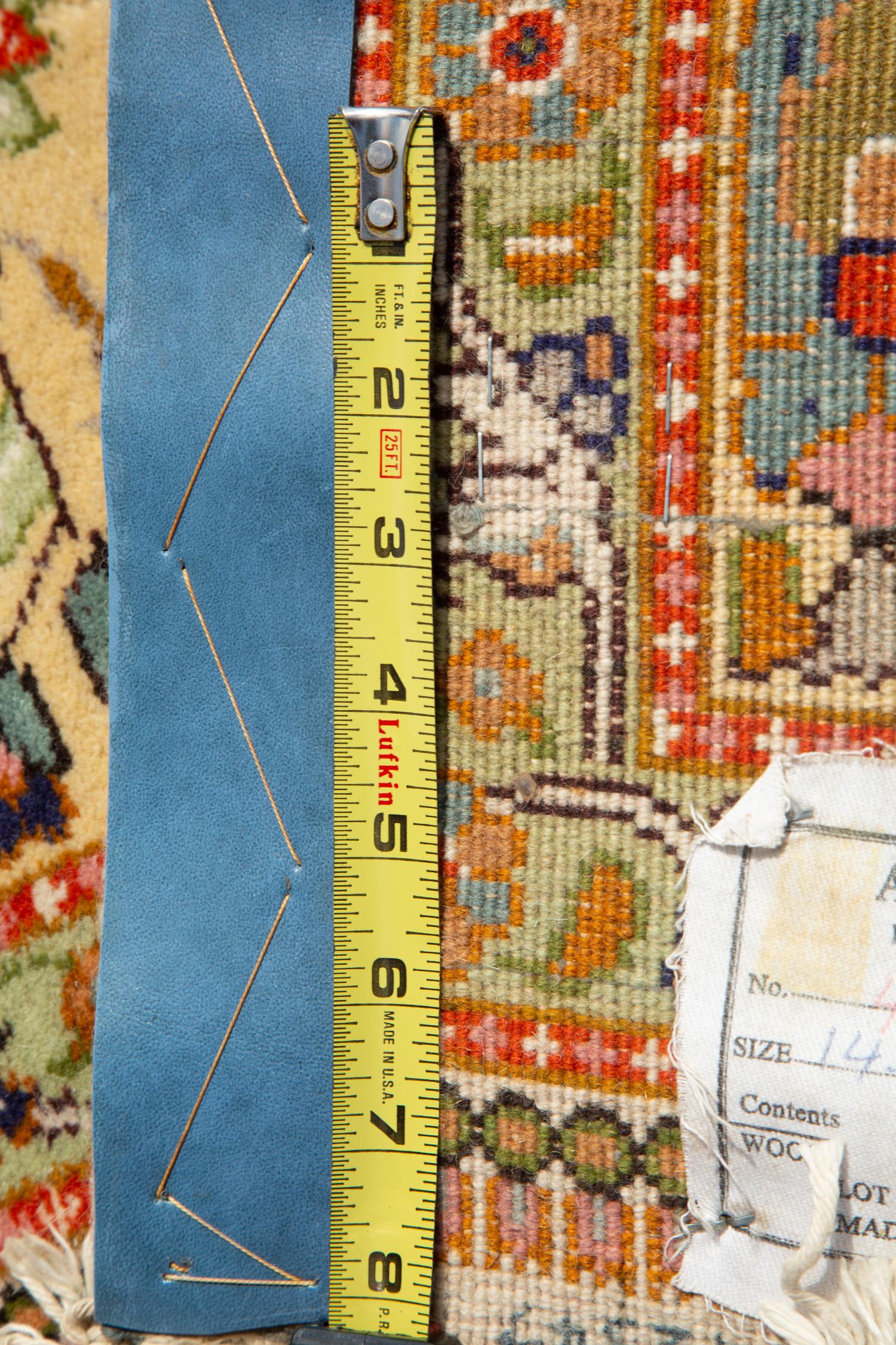 A Tabriz Hunting Design Border Wool Rug