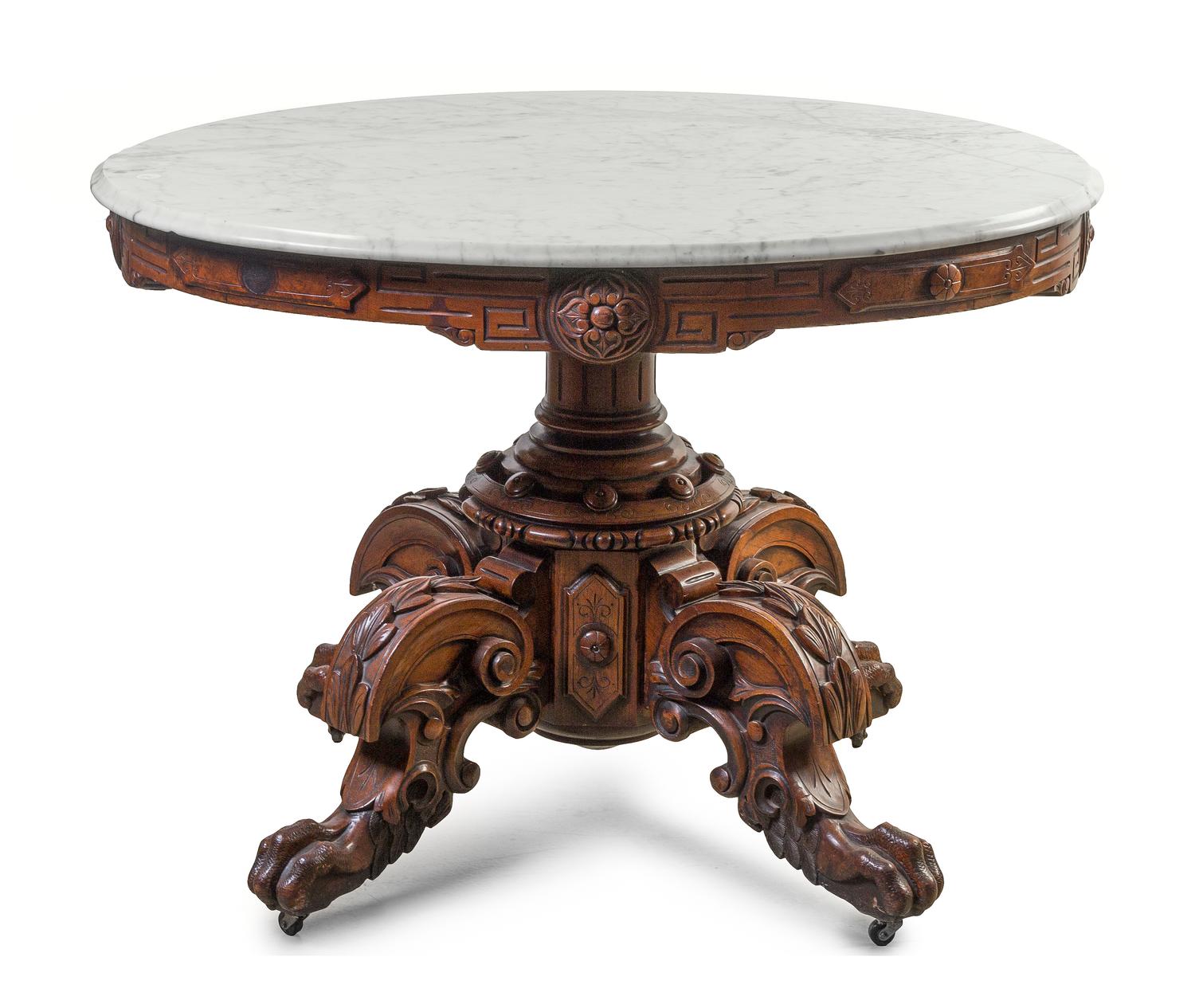 A Victorian Walnut Center Table, Height 29 3/4 x width 41 x depth 30 3/4 inches.