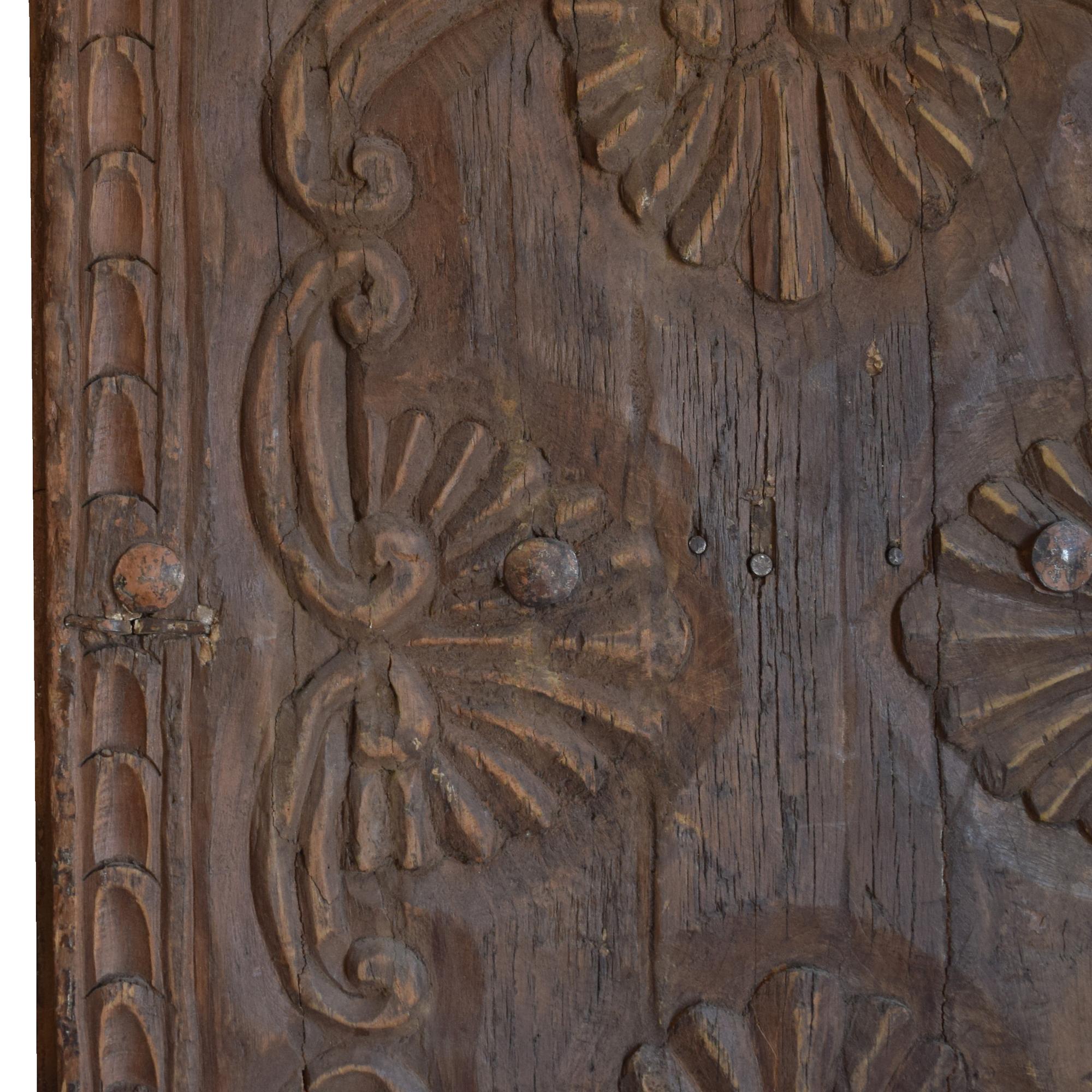 A Pair of Carved Wood Doors 27" W x 3" D x 78" H and 29" W x 4" D x 79" H — Peru, 19th/20th Century