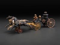 A Painted Cast Iron Three-Horse Fire Pump Wagon Toy