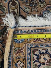 A Qum Silk and Wool Rug