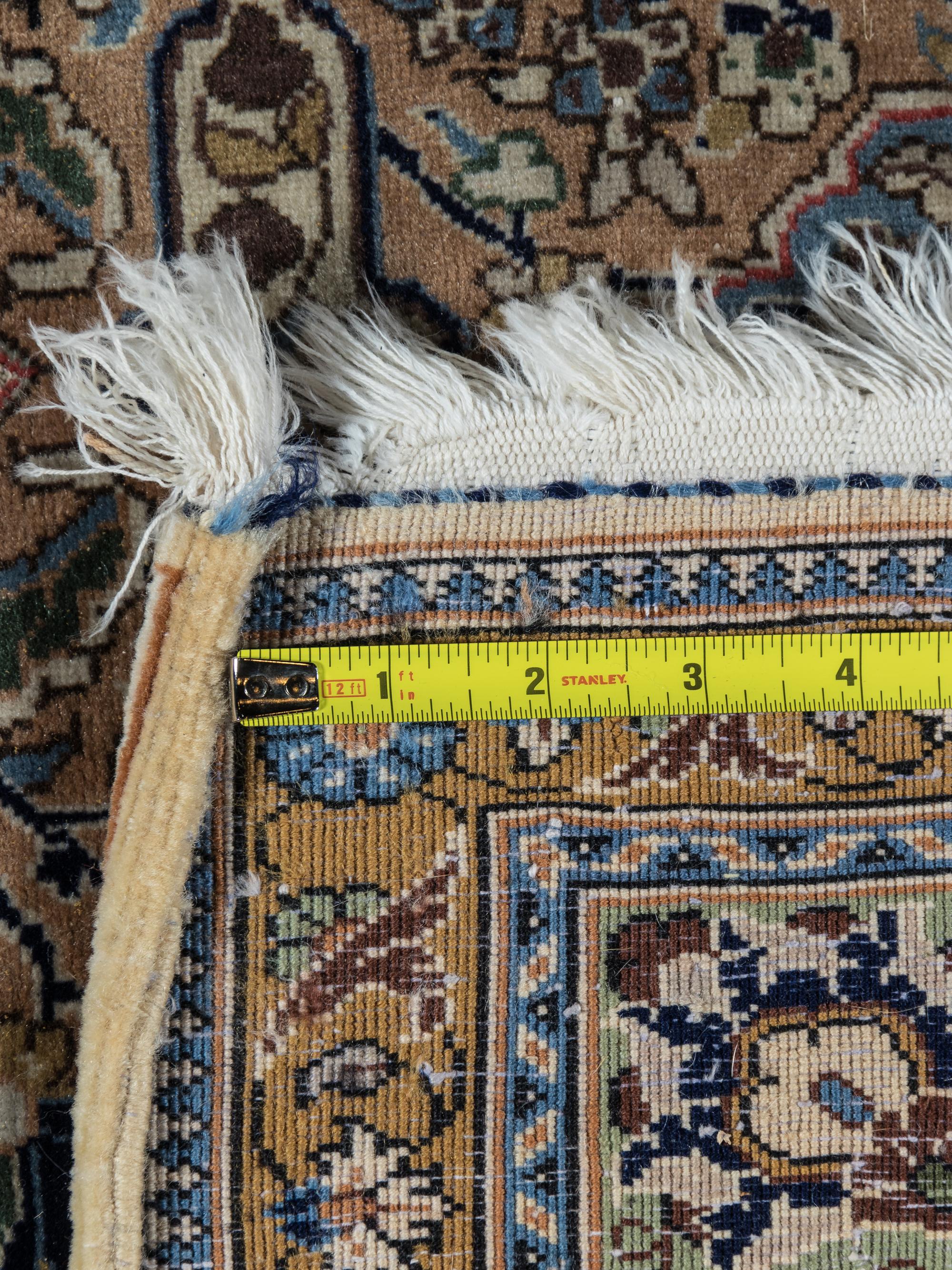 A Qum Silk and Wool Rug