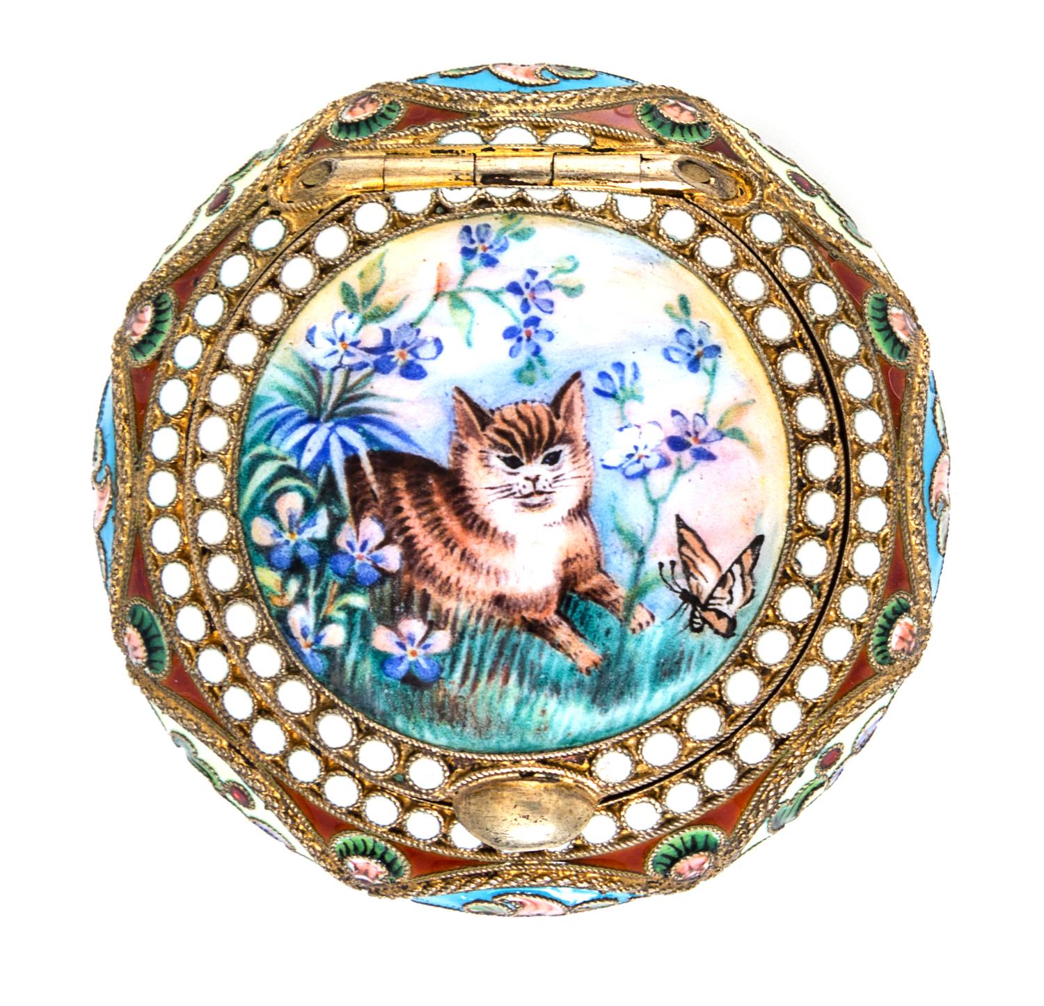 A Russian Enameled Silver Pill Box, Nikolai Alekseev, Moscow, 1896-1908, of circular form, the lid decorated with a kitten and butterfl