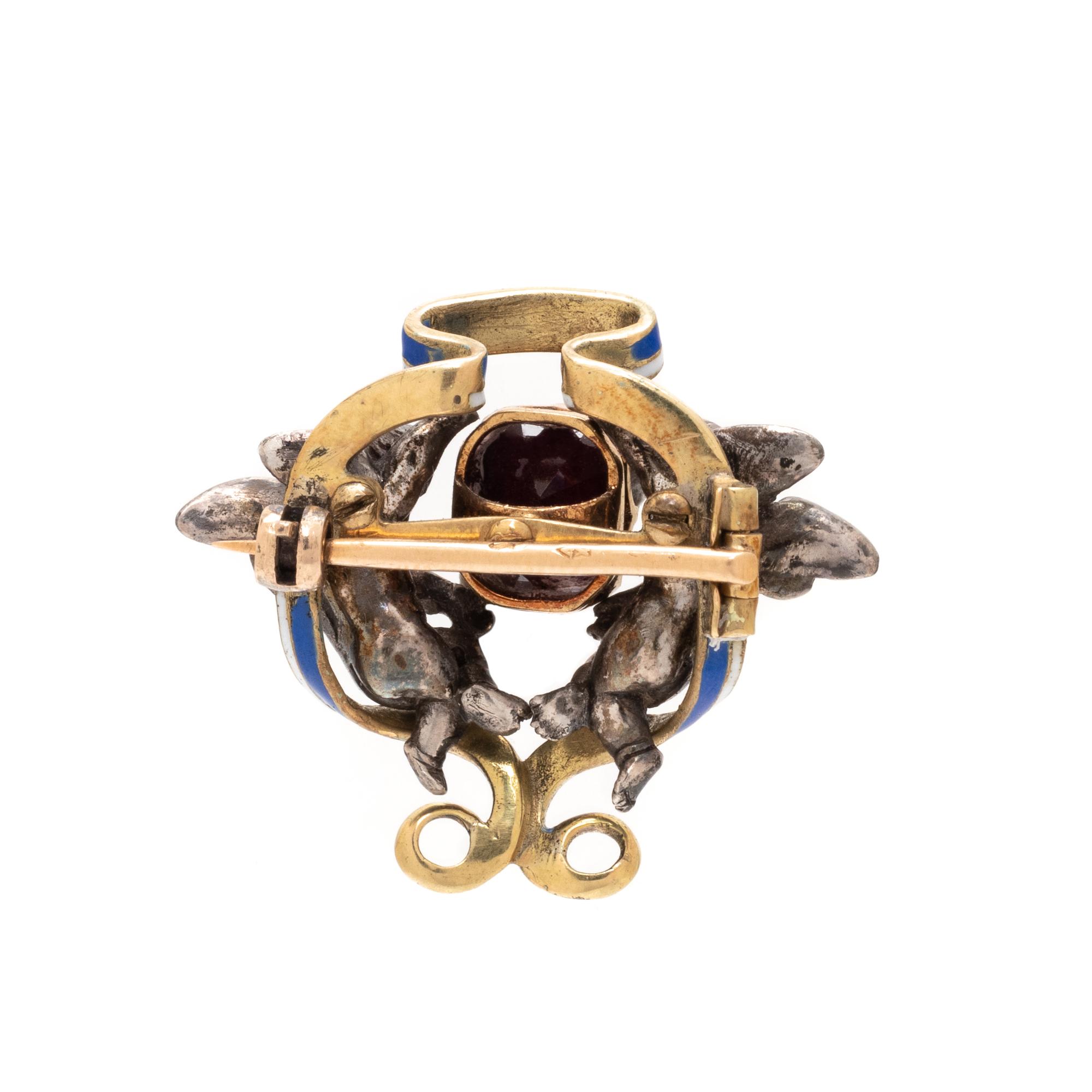 FRENCH, ANTIQUE, GARNET AND ENAMEL CHERUB BROOCH