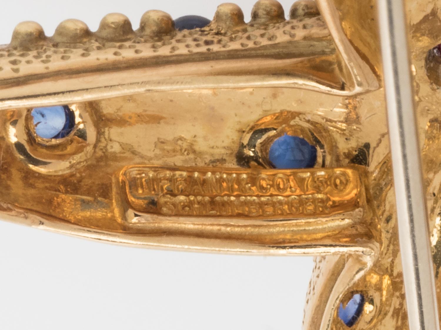 TIFFANY & CO., SCHLUMBERGER, YELLOW GOLD, RUBY AND SAPPHIRE STARFISH BROOCH
