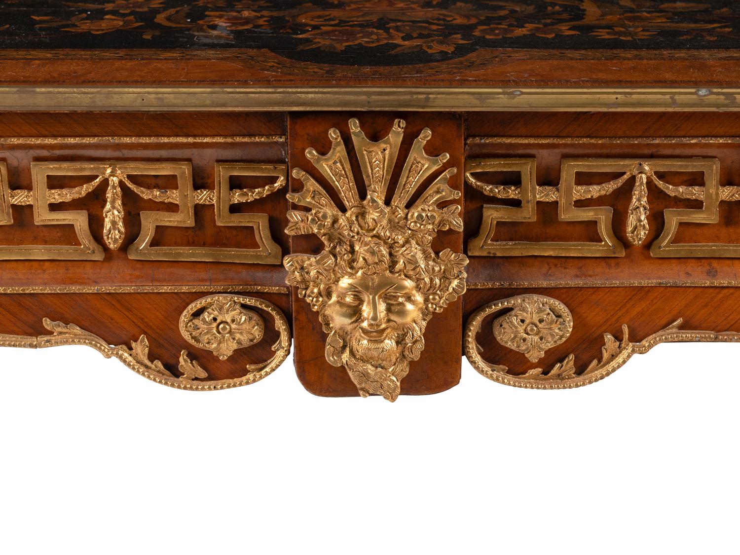 A Régence Style Gilt Bronze Mounted Kingwood and Floral Marquetry Table