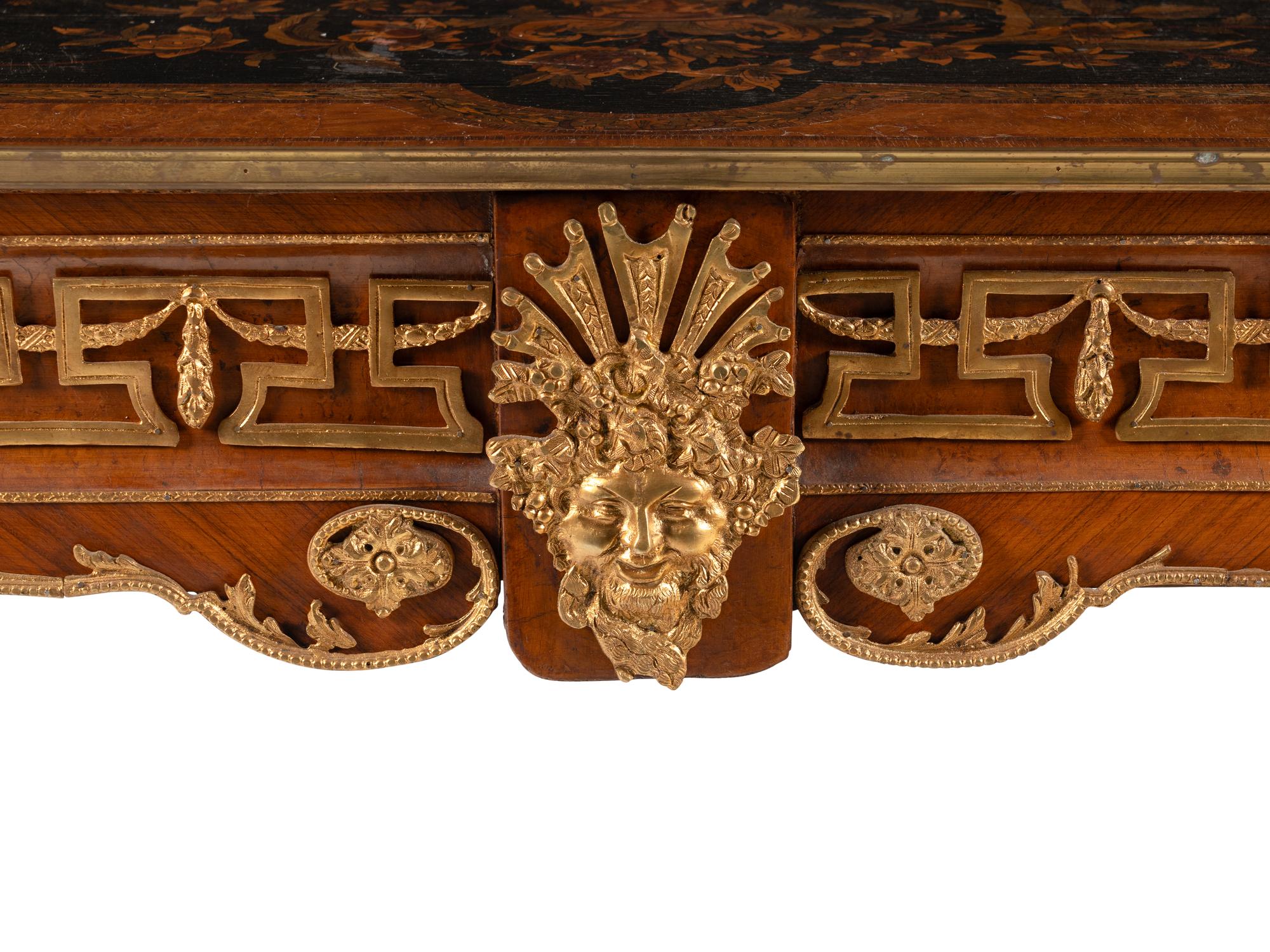 A Régence Style Gilt Bronze Mounted Kingwood and Floral Marquetry Table