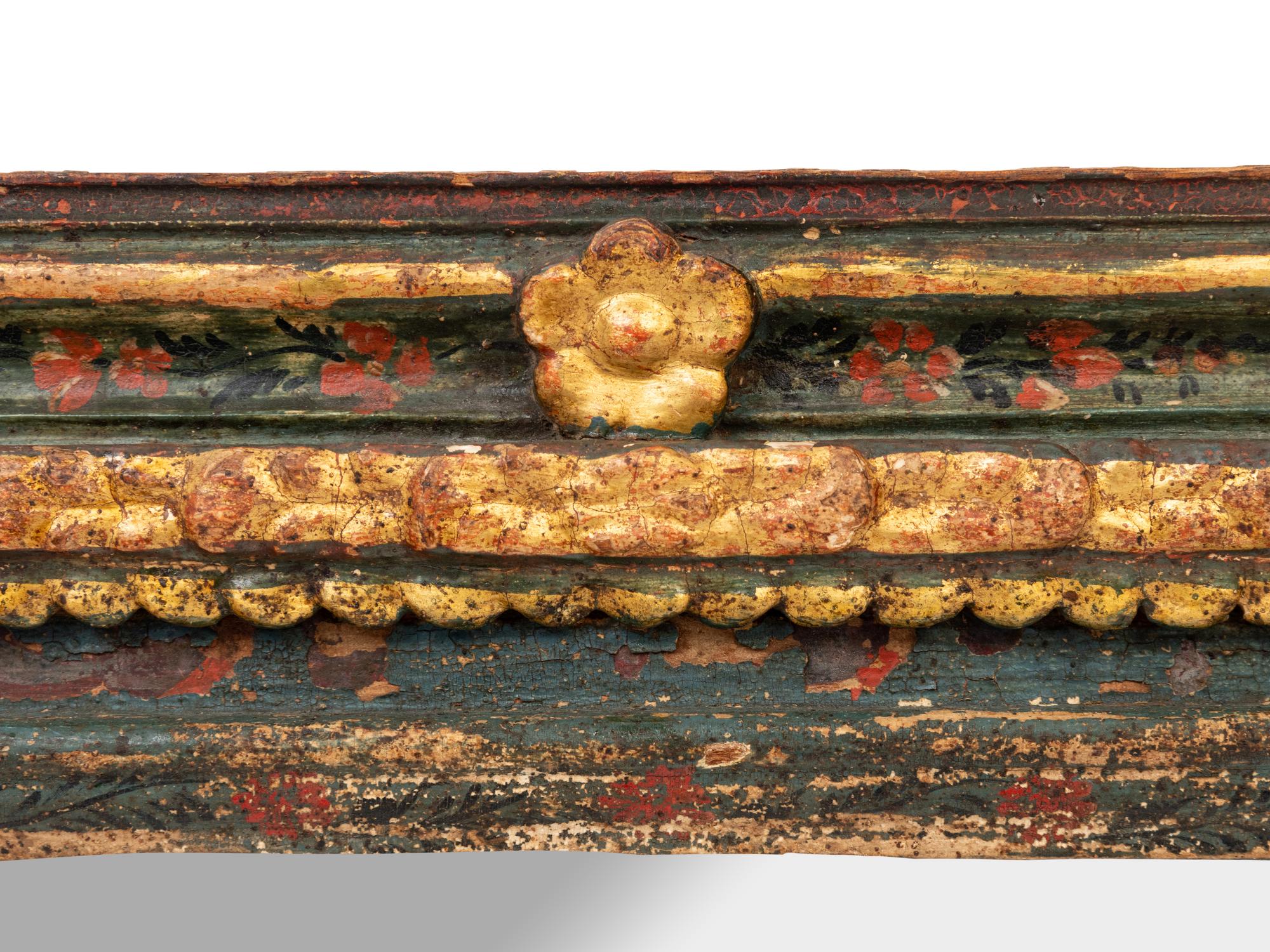 A Spanish Colonial Painted and Parcel Gilt Mirror