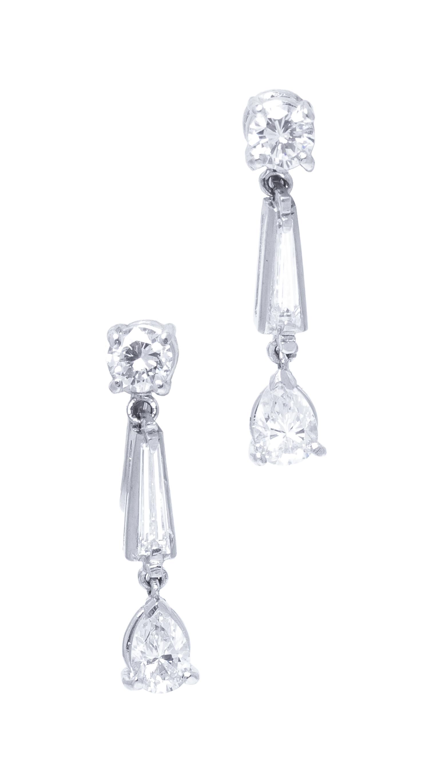 A Pair of 14 Karat White Gold and Diamond Dangle Earrings, 2.65 dwts.
