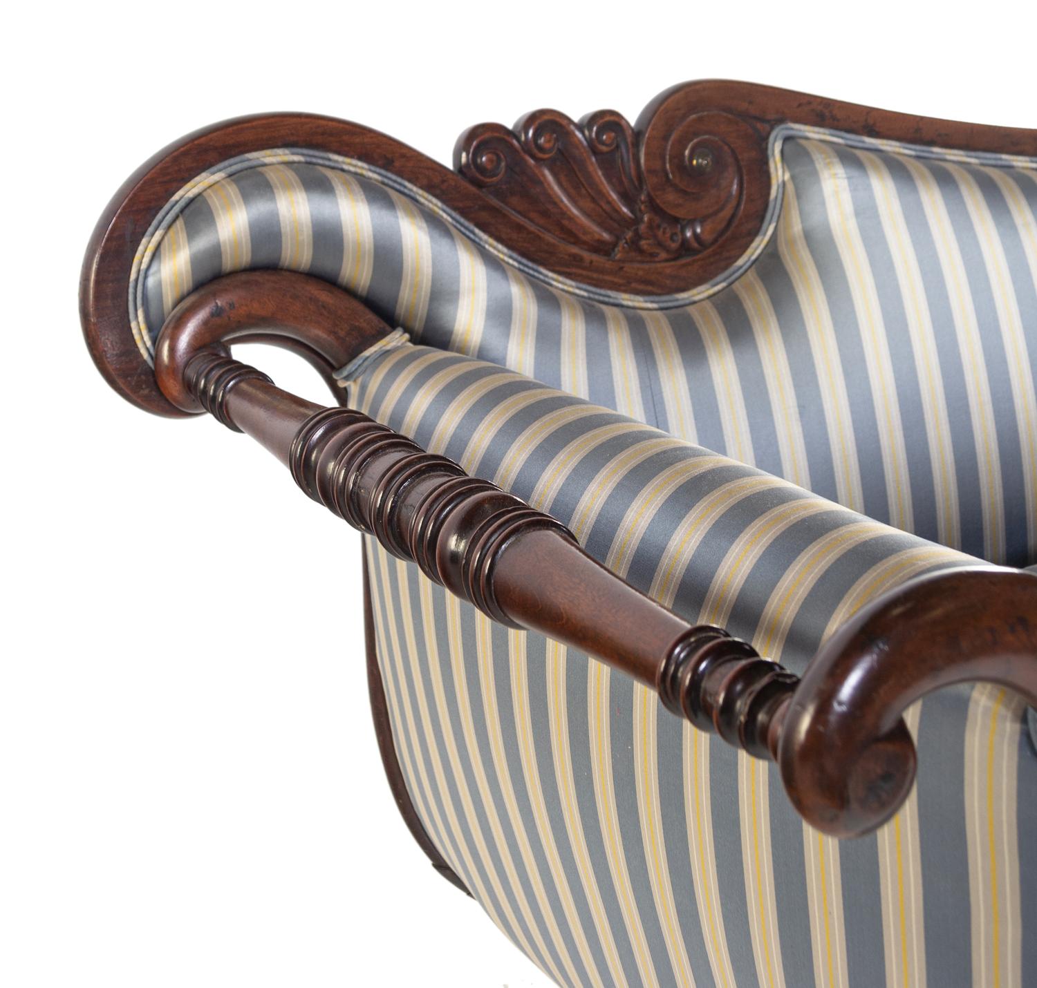 A George IV Brass Mounted Carved and Figured Mahogany Sofa