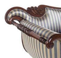 A George IV Brass Mounted Carved and Figured Mahogany Sofa