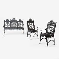 A pair of black-painted cast iron garden armchairs and bench Jacob Sobers, Philadelphia, PA, and John Mclean, New York, NY, late 19th century