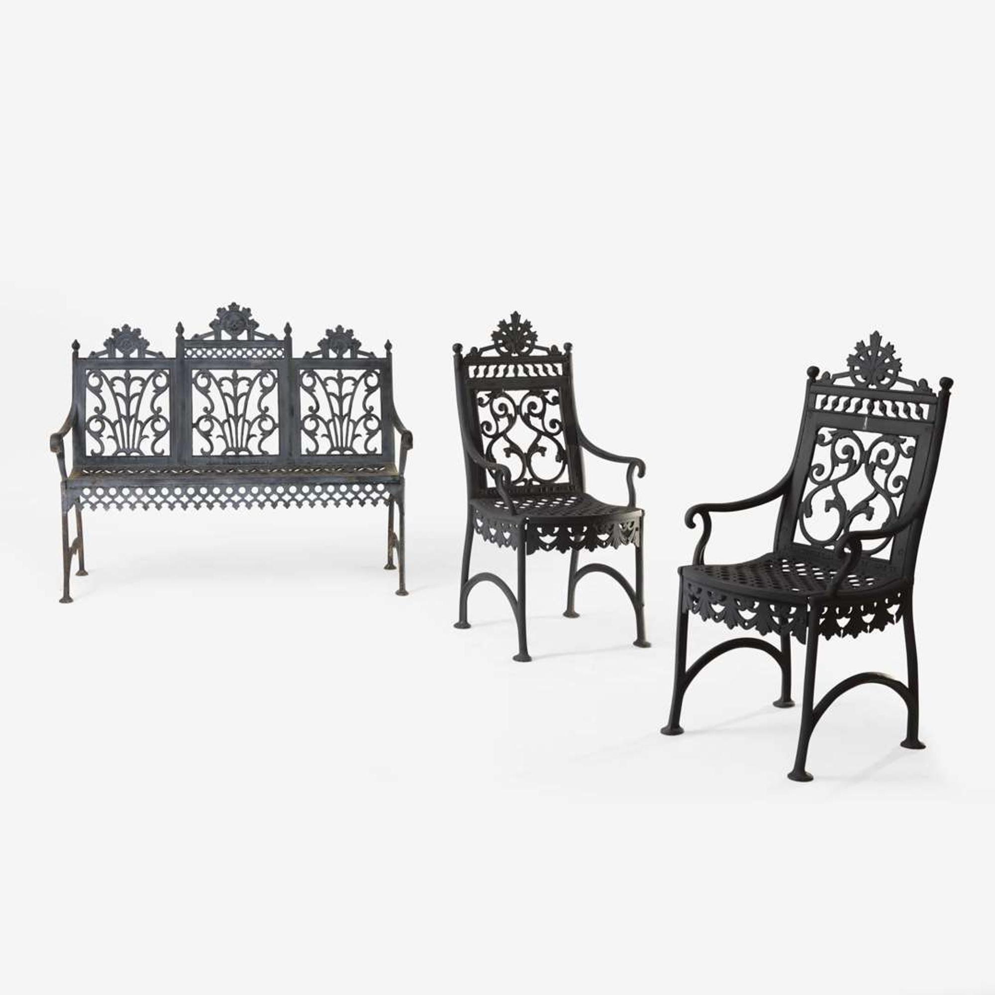 A pair of black-painted cast iron garden armchairs and bench Jacob Sobers, Philadelphia, PA, and John Mclean, New York, NY, late 19th century