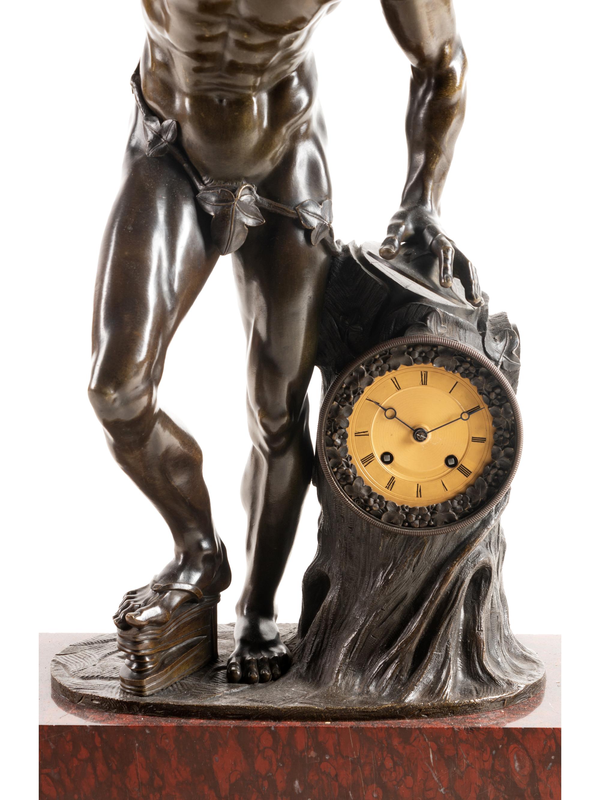 A Continental Patinated Bronze Figural Mantel Clock