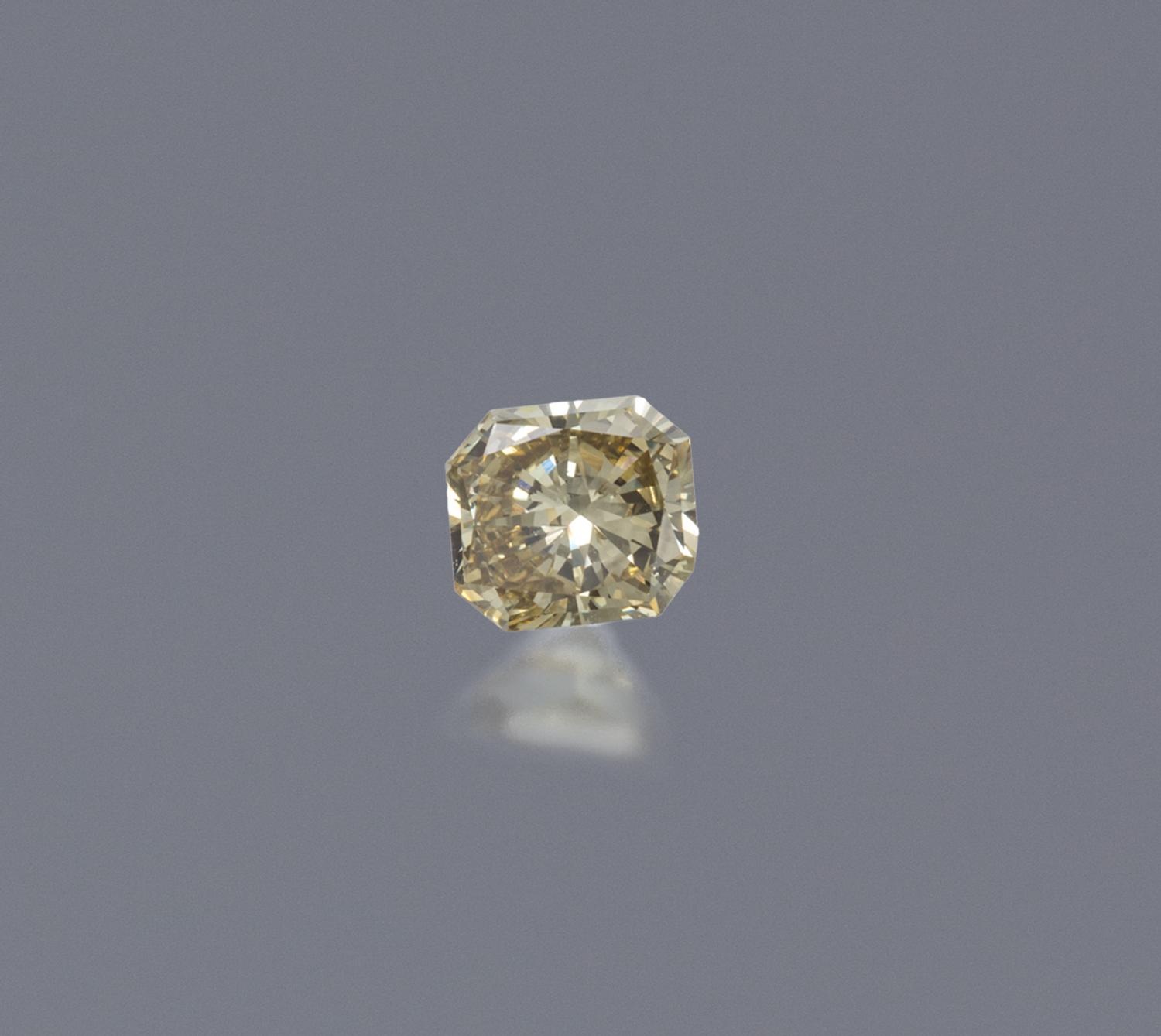 A 0.76 Carat Fancy Brown Yellow Radiant Cut Diamond,
