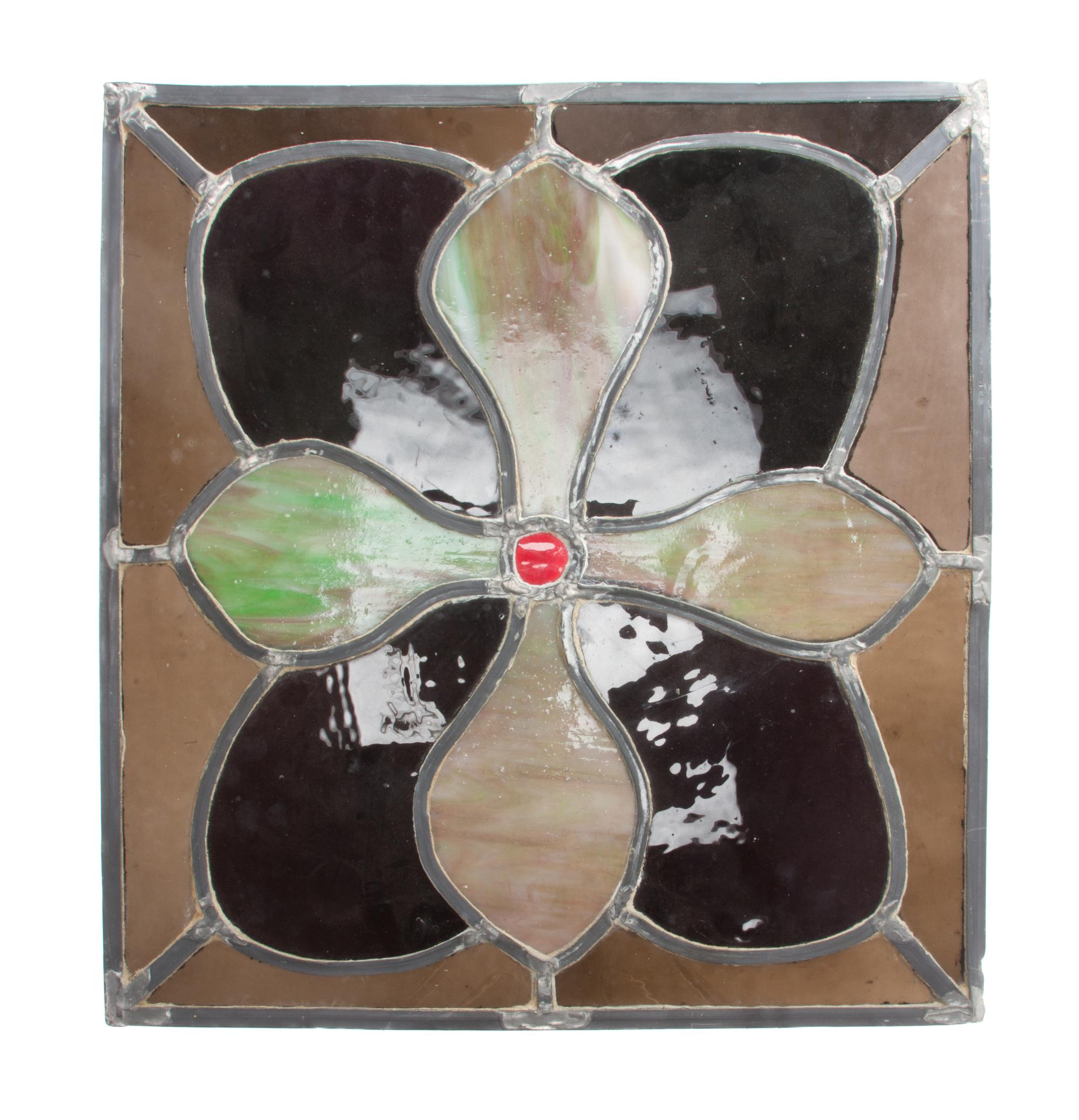 A Collection of Twelve Leaded Glass Windows Largest: 17 1/2 x 39 1/2 inches.