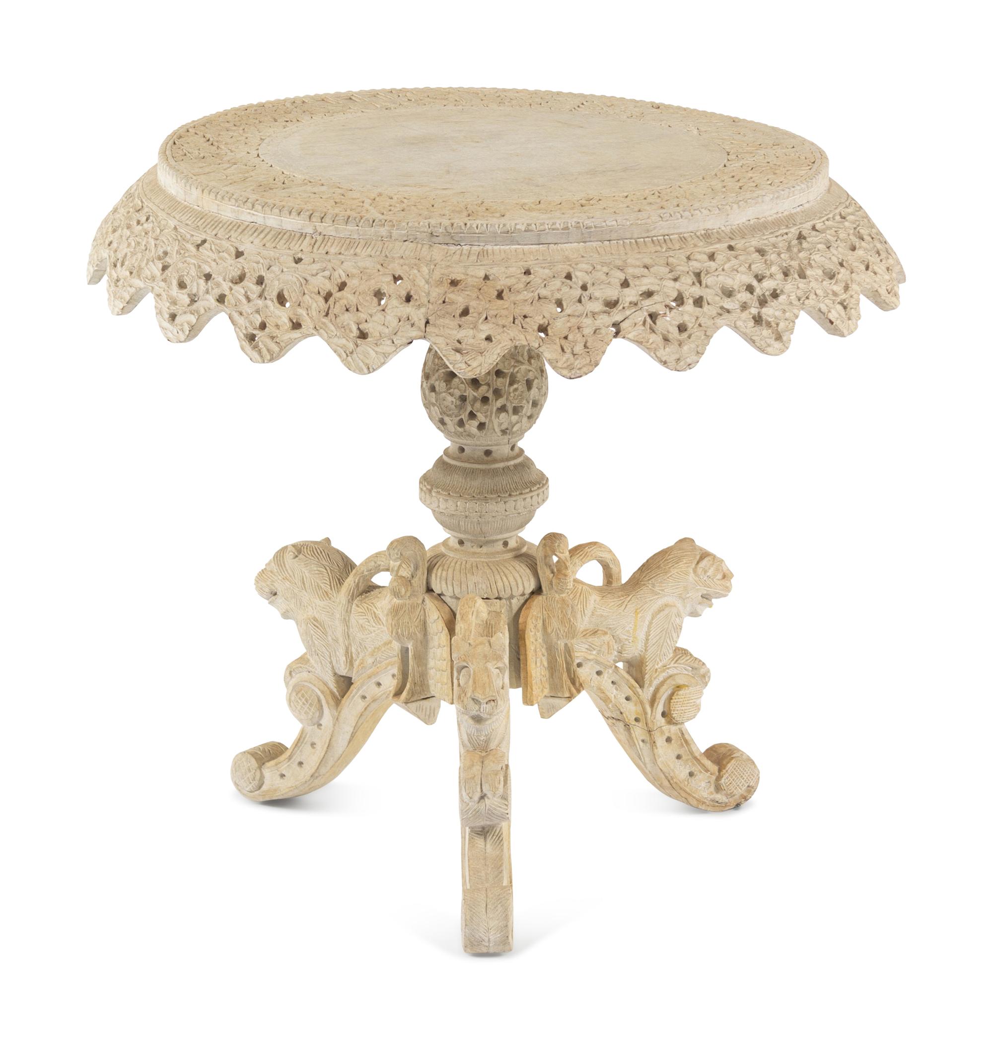 A Pair of Indian Painted Teakwood Armchairs and a Similar Table