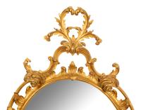 A Rococo Style Carved Giltwood Mirror