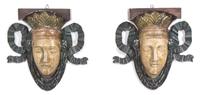 A Pair of Italian Painted and Carved Mask Wall Brackets Height 13 inches. — 20TH CENTURY