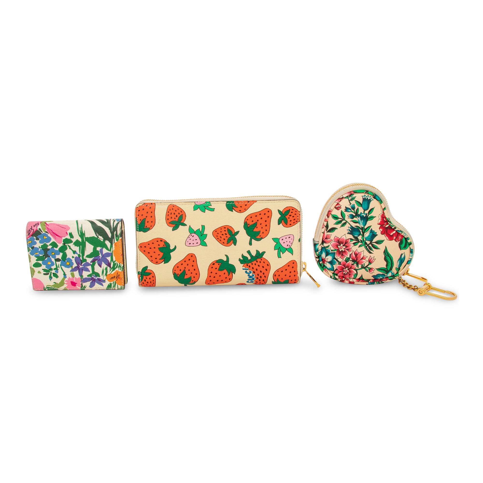 GUCCI, THREE PRINTED WALLETS