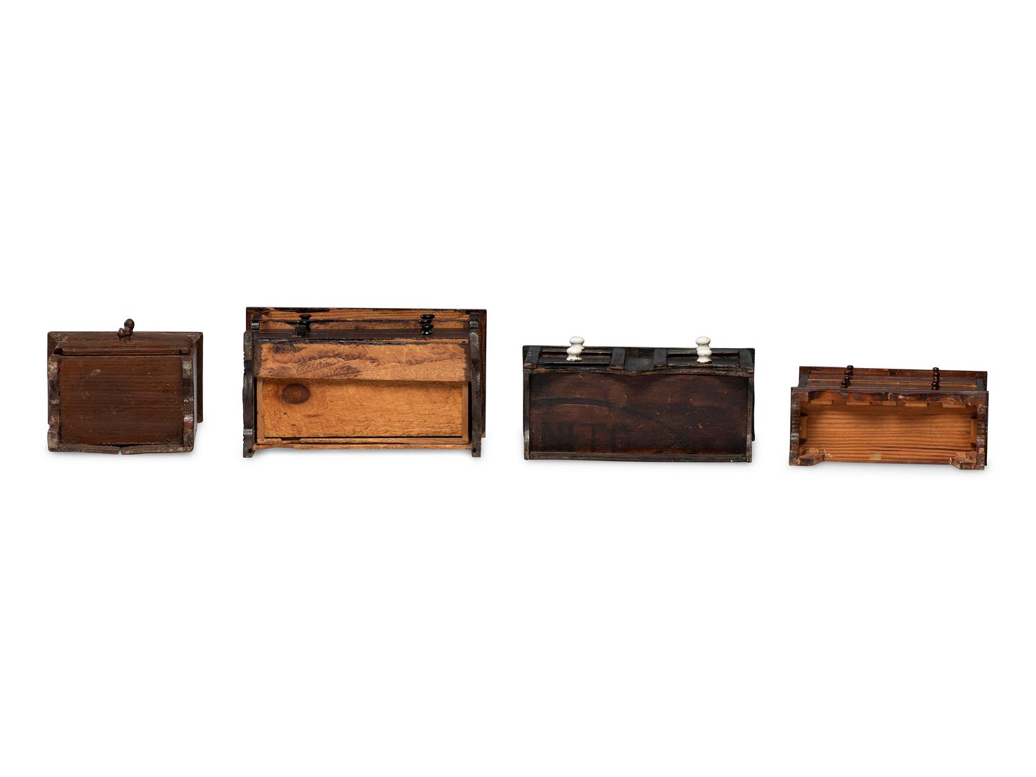 Four Painted or Stained Miniature Chests of Drawers