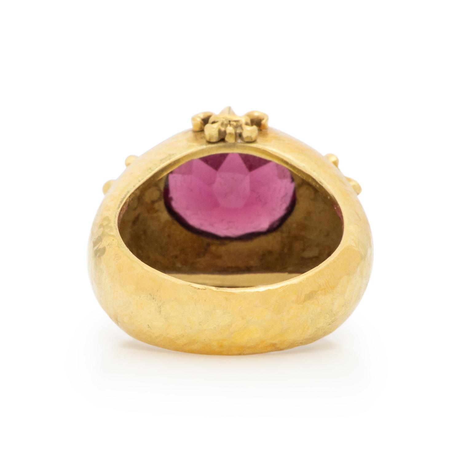 MAZ, YELLOW GOLD AND GARNET RING