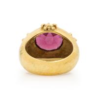 MAZ, YELLOW GOLD AND GARNET RING