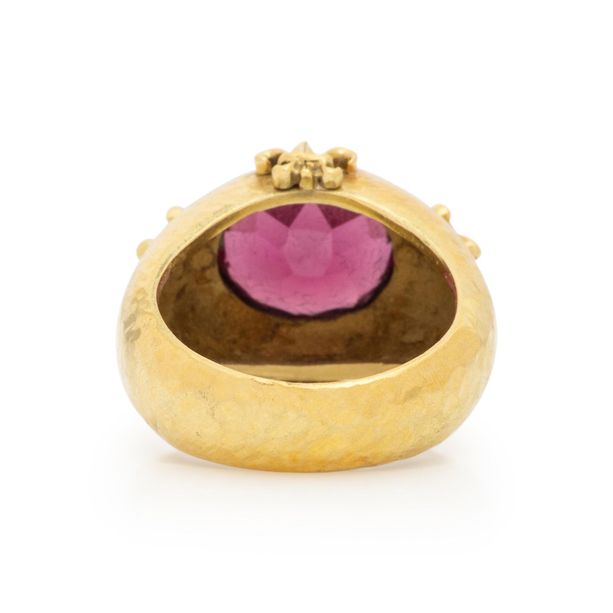 MAZ, YELLOW GOLD AND GARNET RING