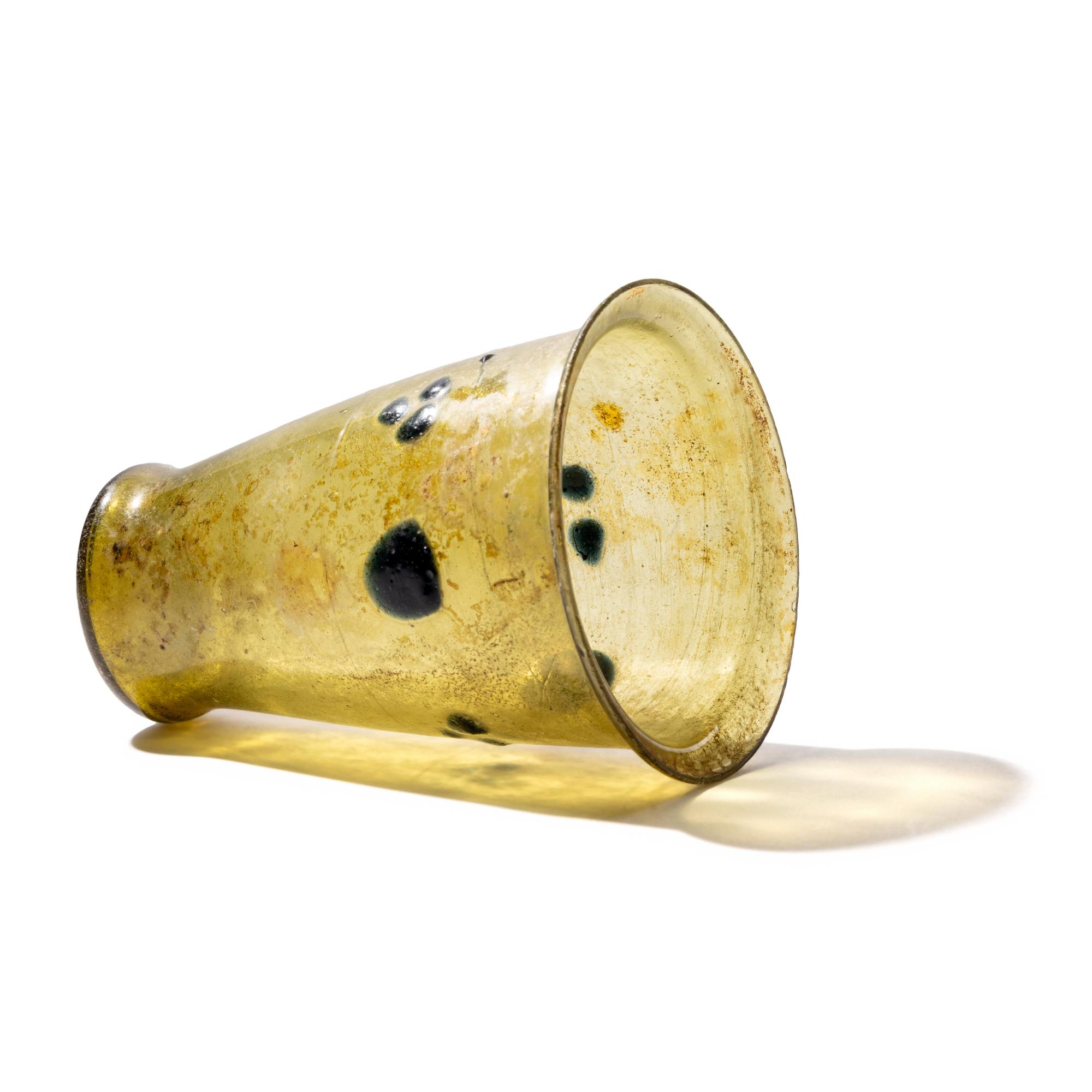 A Late Roman Glass Cup with Blue Dots