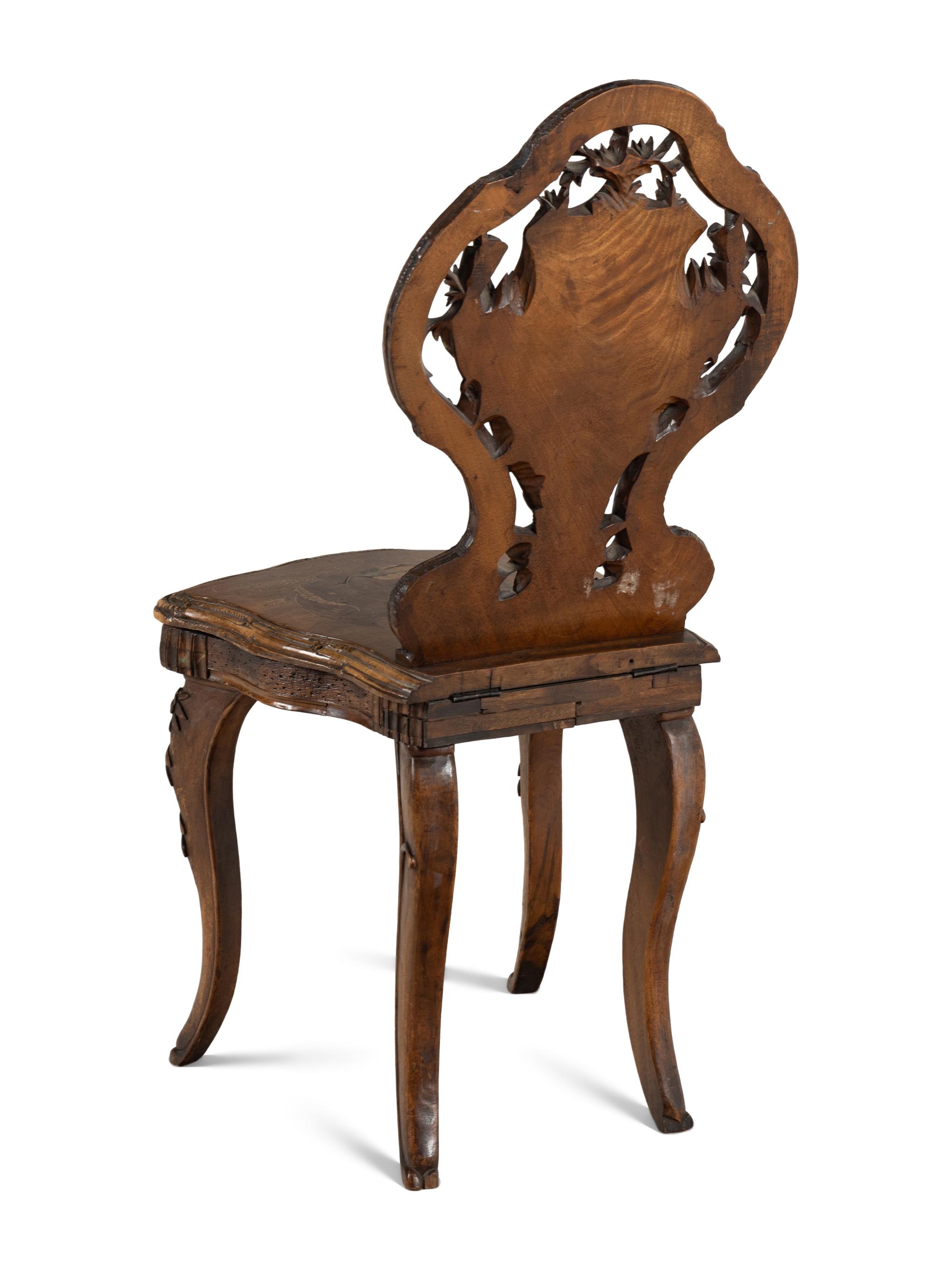 A Black Forest Carved Musical Chair