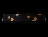A Japanese Gold and Black Lacquer Rectangular Box