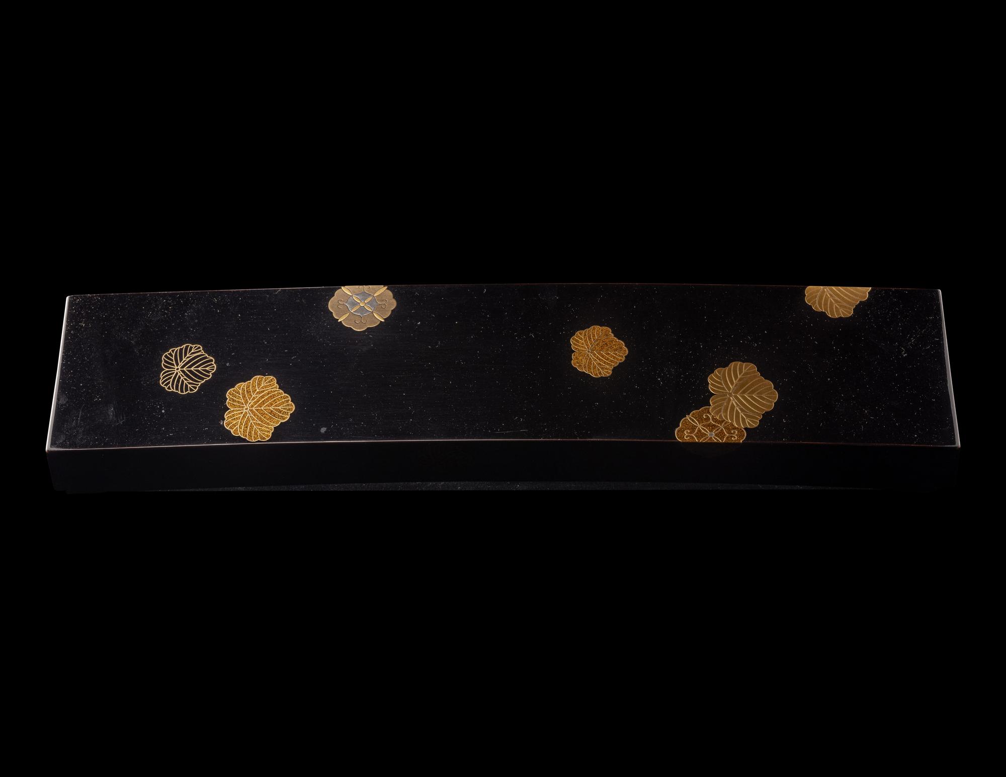 A Japanese Gold and Black Lacquer Rectangular Box