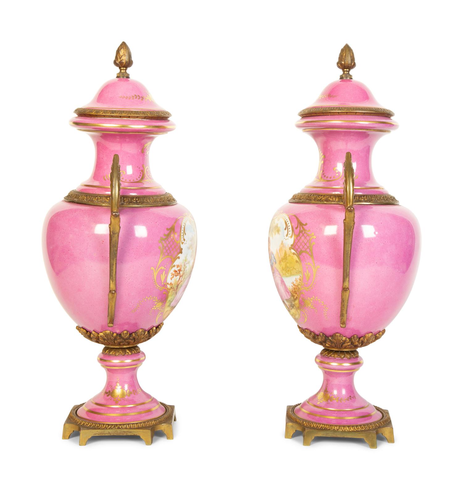 A Pair of French Porcelain Lidded Urns
