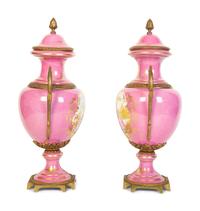 A Pair of French Porcelain Lidded Urns