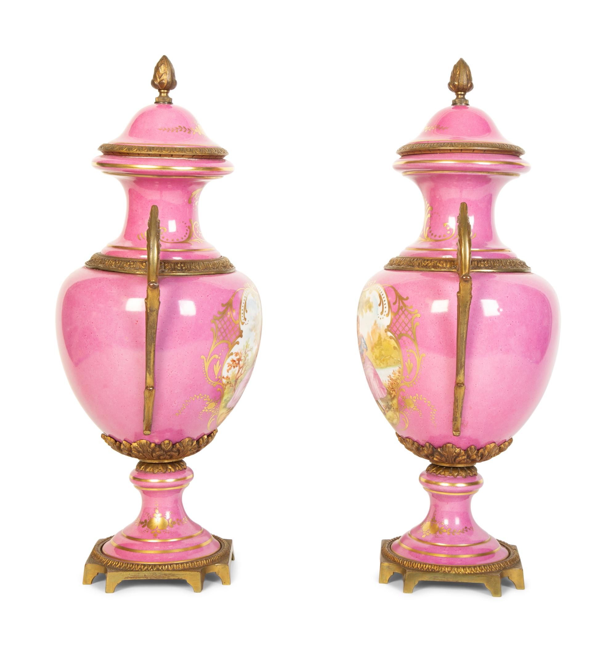 A Pair of French Porcelain Lidded Urns