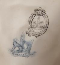 A Pair of Belleek Tri-Dolphin Compotes, Diameter 9 3/4 inches.