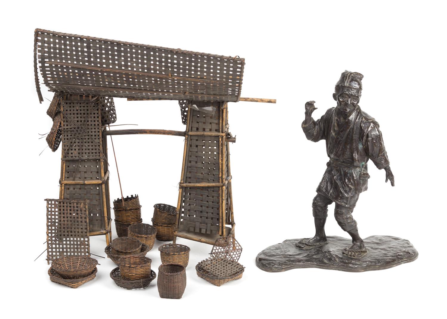 A Bronze Figure of a Man 24 1/4 x 17 3/4 inches. — MEIJI PERIOD (1868-1912)