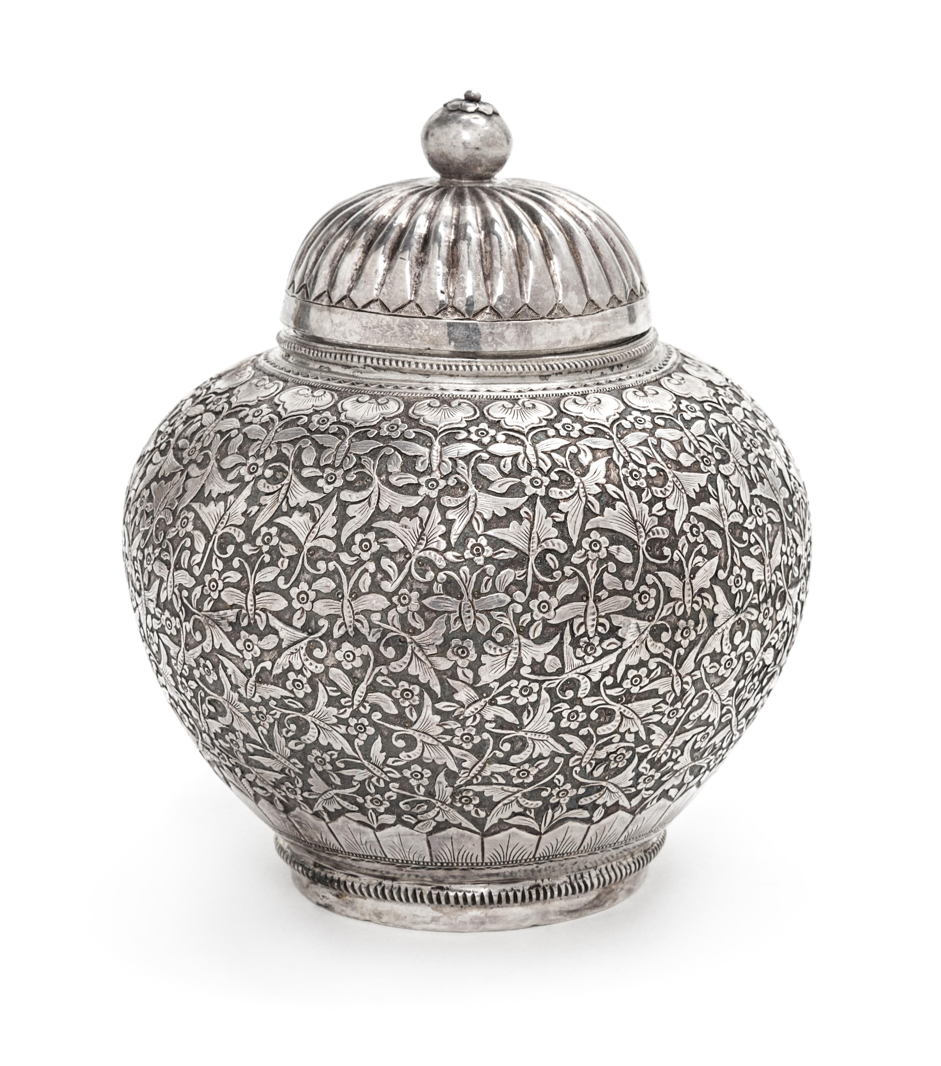 A Chinese Silver Covered Jar, , the underside chased with two-character maker's mark Li Zhen, the other wen yin (fine silver).
