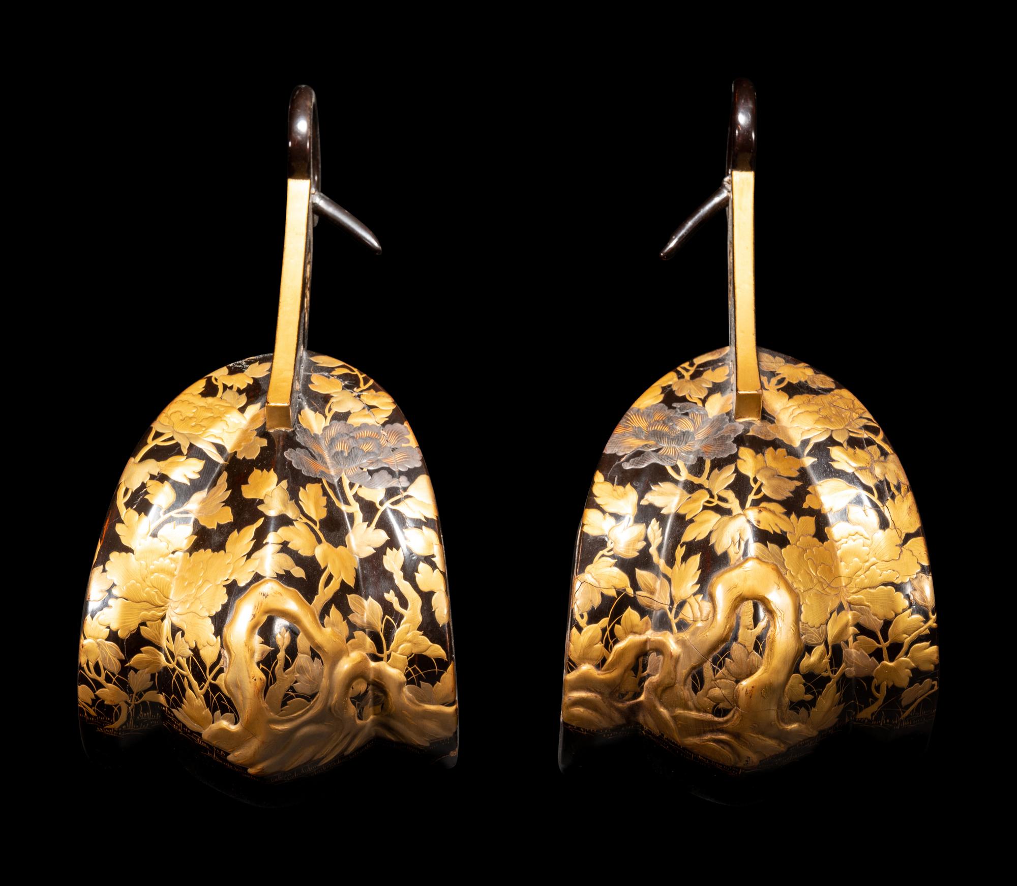 A Pair of Japanese Gold and Black Lacquered Stirrups