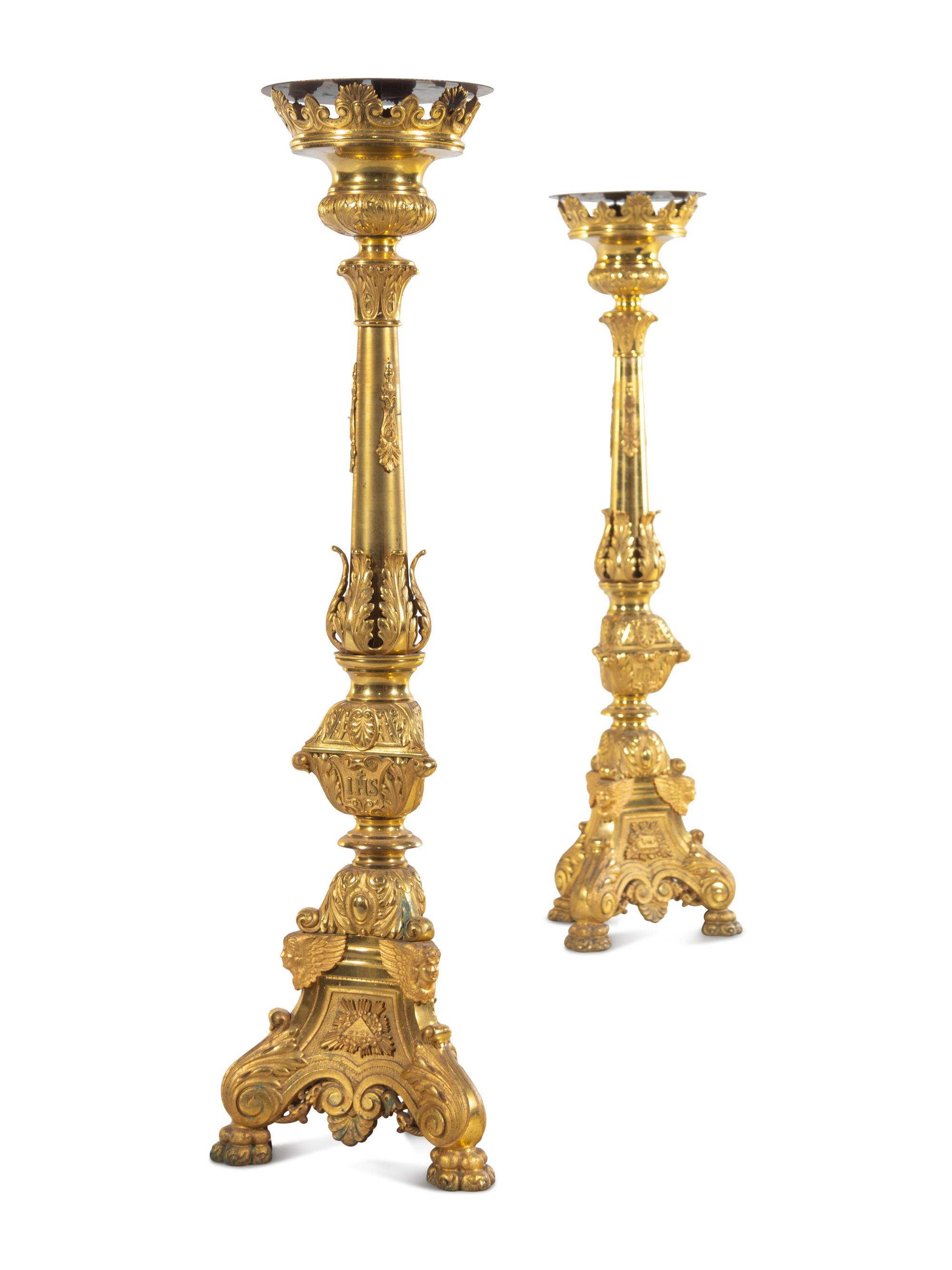 A Pair of Gilt Brass Altar Candlesticks with Associated Marble Tops