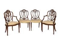 A Mahogany Dining Table and An Associated Set of Eight Mahogany Chairs