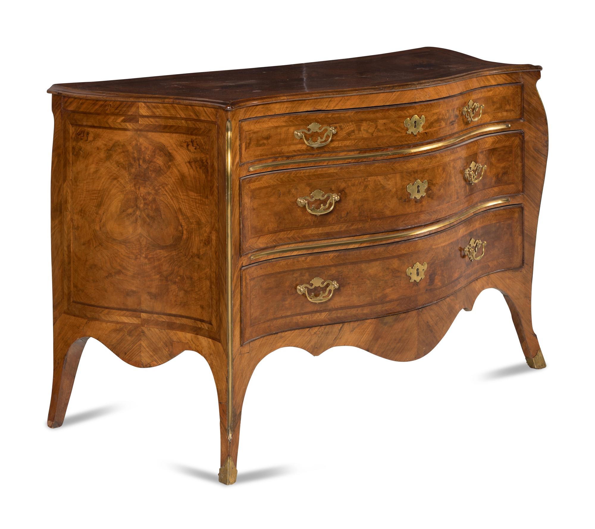 An Italian Gilt Bronze Mounted Serpentine Walnut Commode
