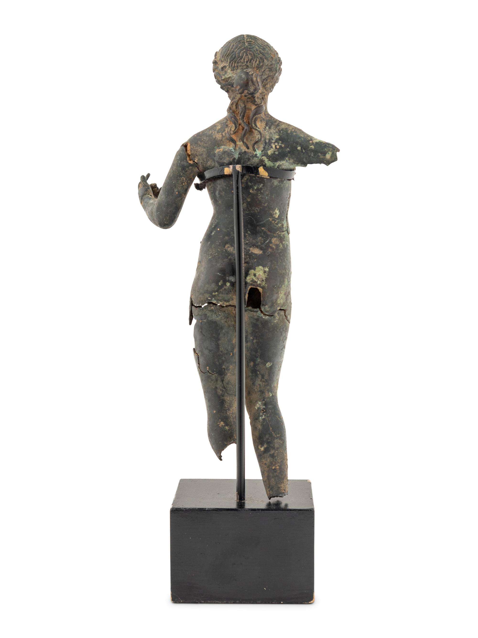 A Fragmentary Bronze Female Figure