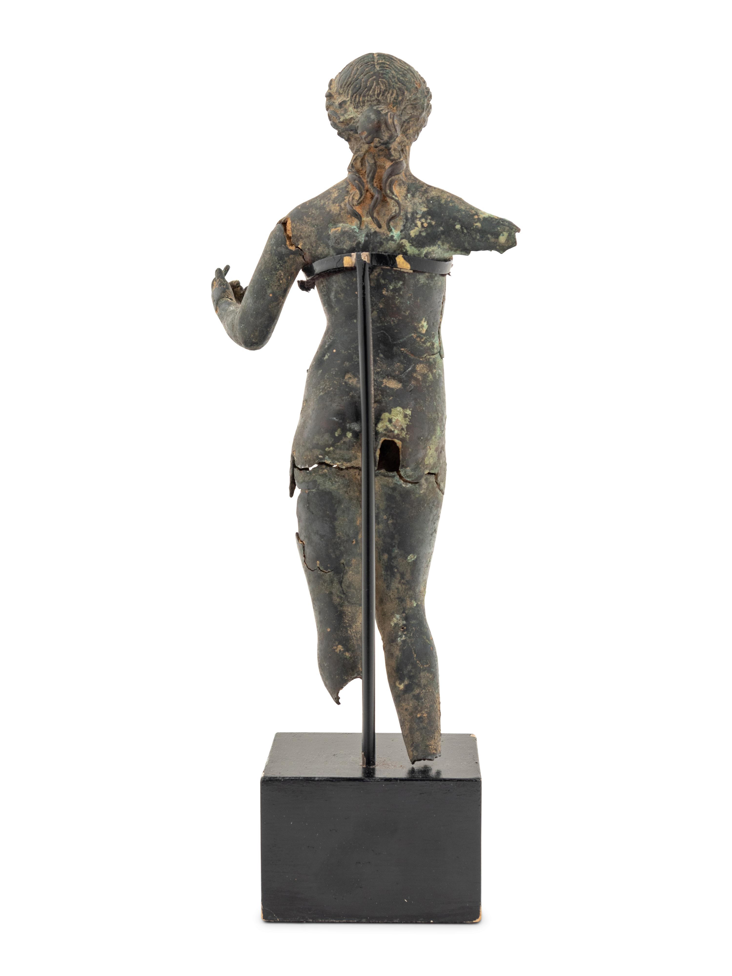 A Fragmentary Bronze Female Figure